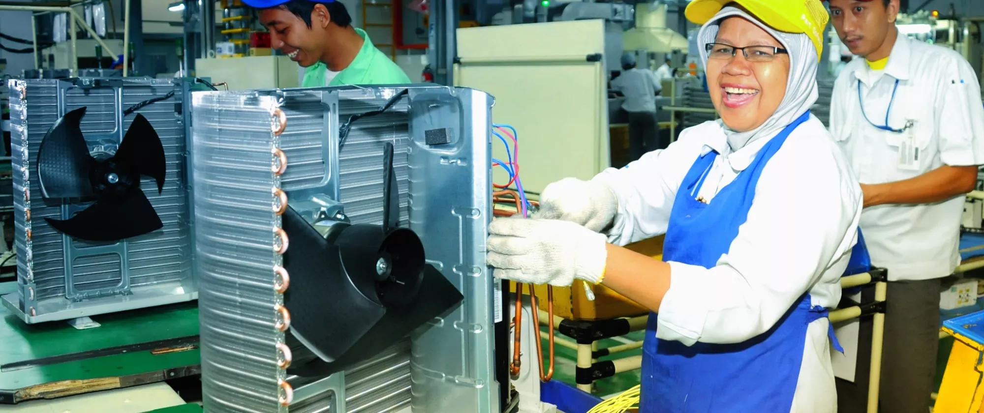 Indonesian male and female factory workers in Cikarang