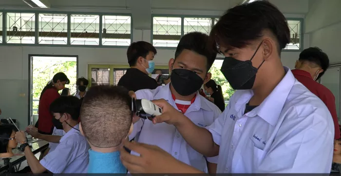 Barber training course for young persons with disabilities in Thailand