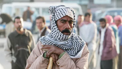 A construction worker in the streets of Baghdad.