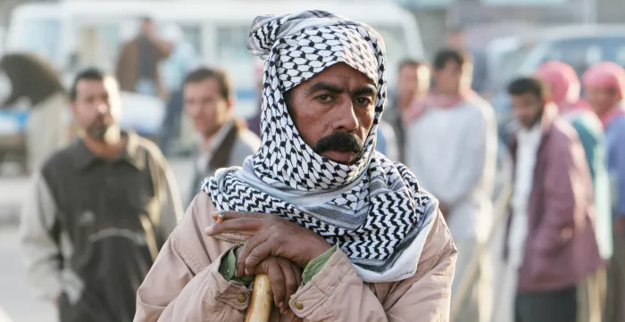 A construction worker in the streets of Baghdad.